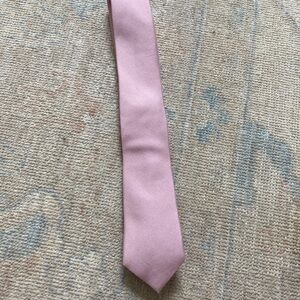 Pink tie.